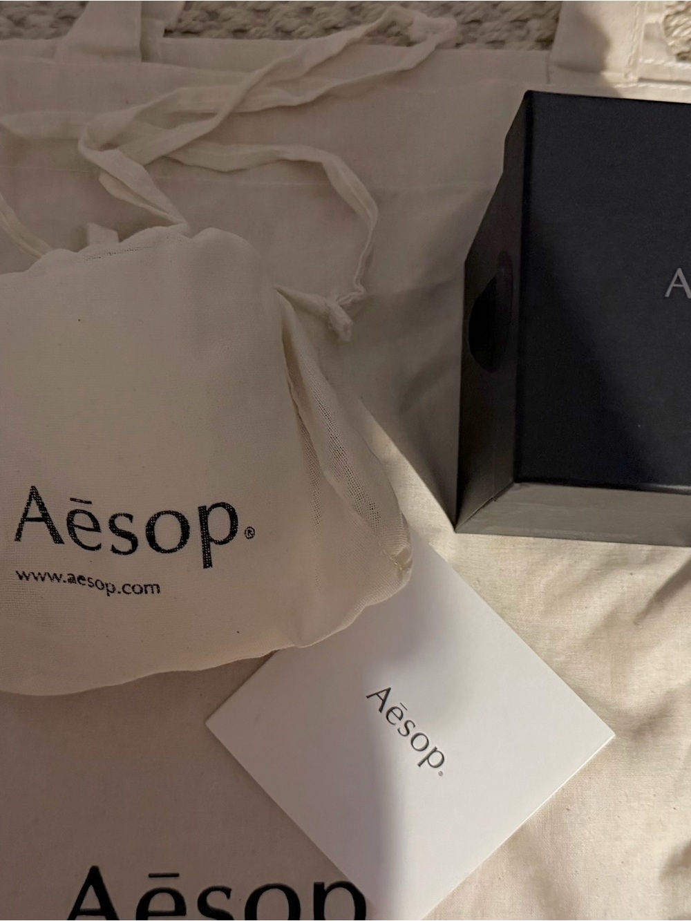Aesop new in box candle with inserts, drawstring bag, box and tote bag